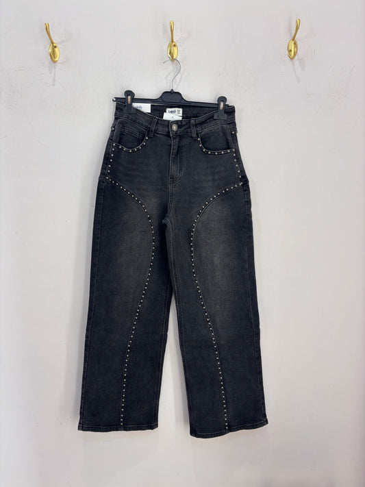 Pantalón tachuelas